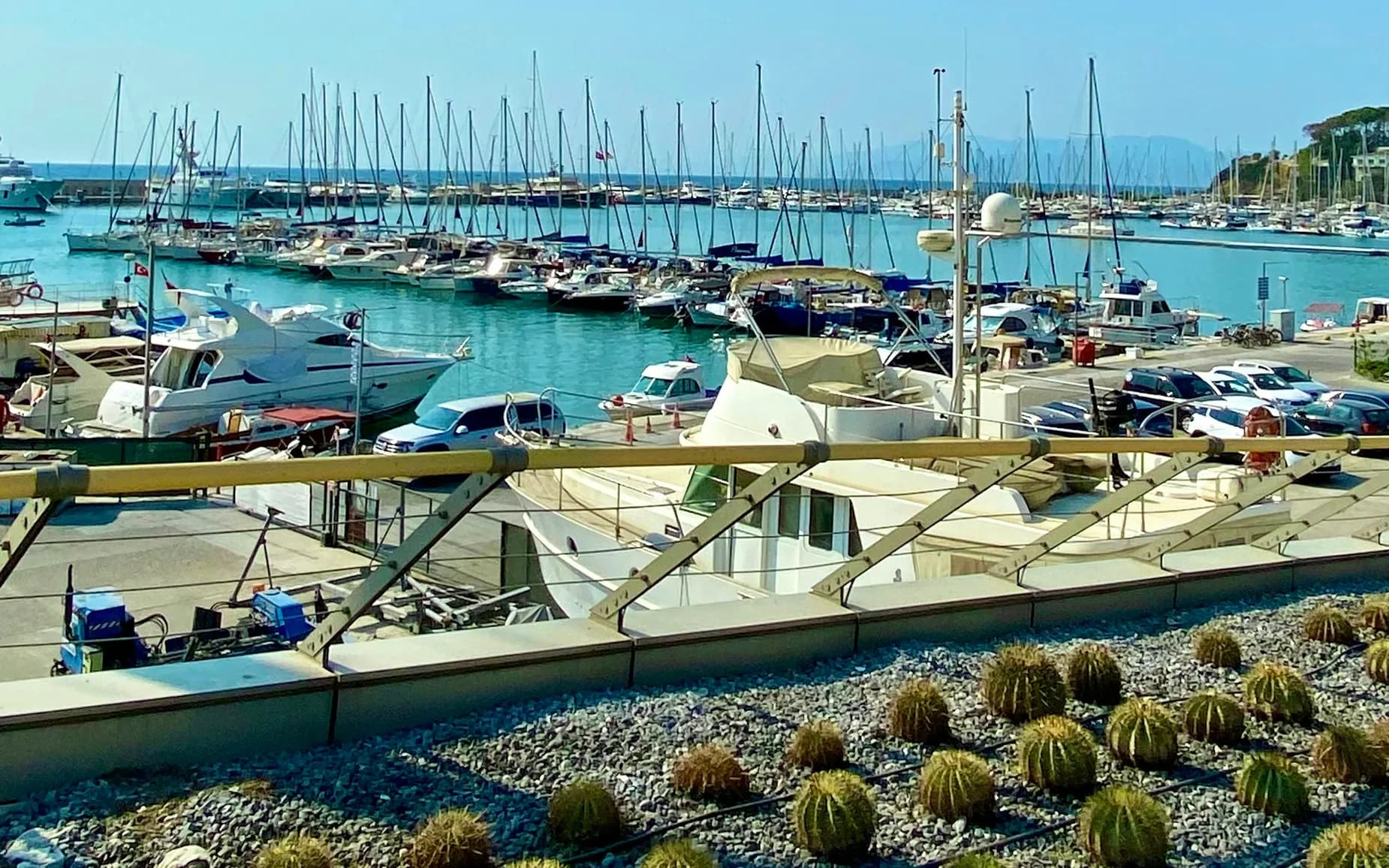 A marina pontoon with yachts moored, covered by long-range Purple WiFi